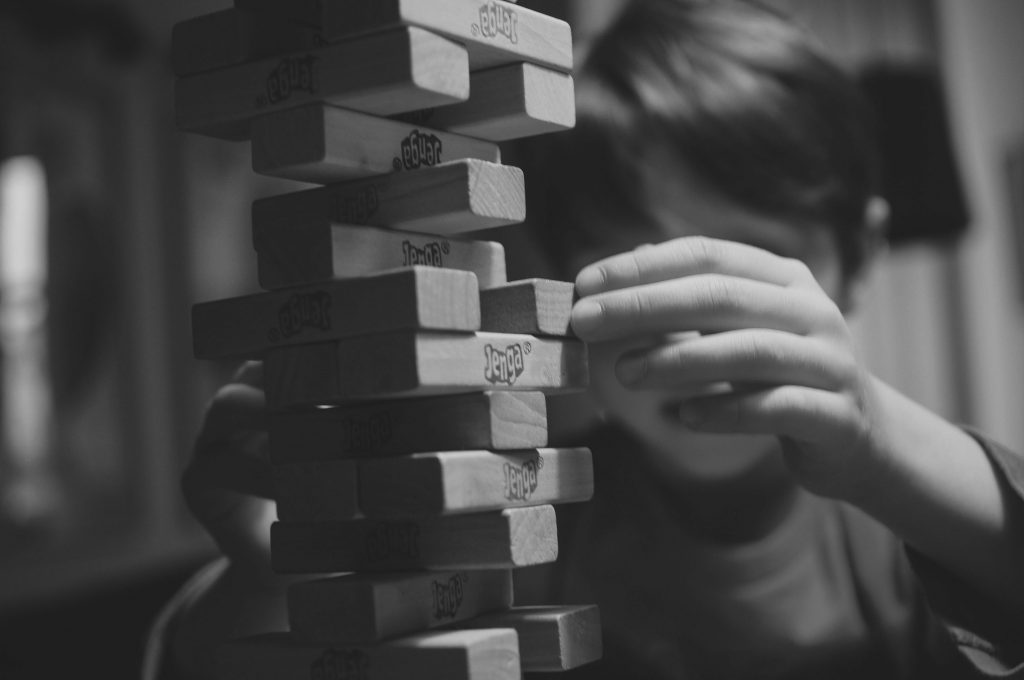 A child playing Jenga.